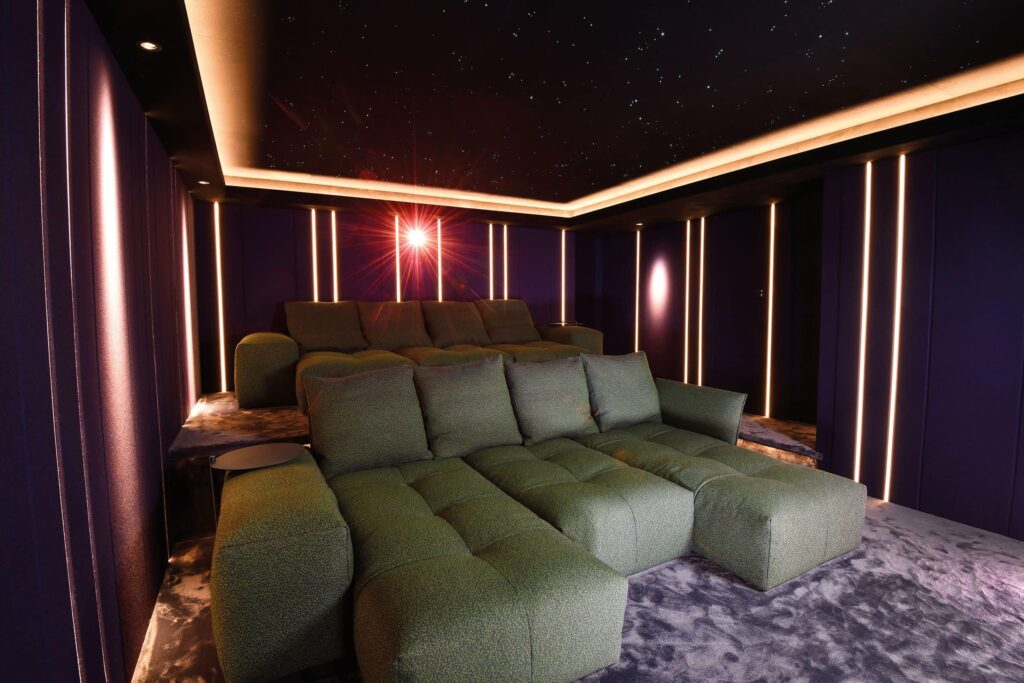 star ceiling home theater with orange accent lighting